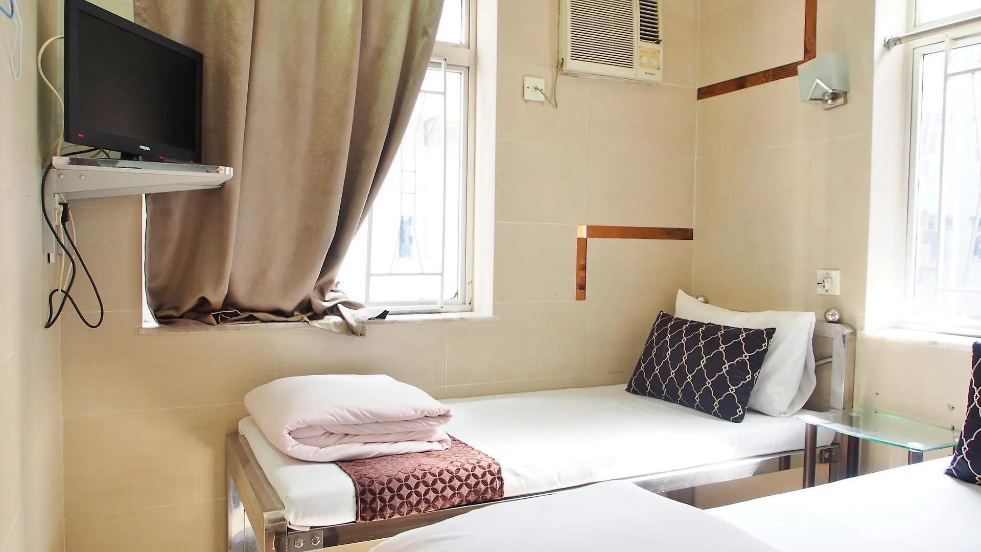 New Grand Guest House Hongkong Čína